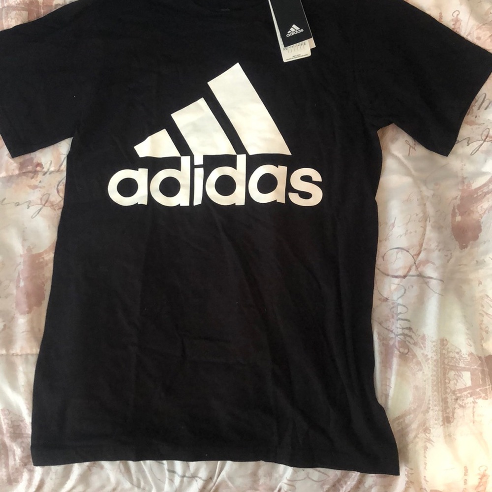 White and black Adidas short sleeve tee.